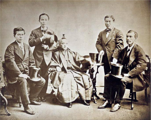 Source 15.6 Members of the Iwakura Mission. Iwakura Tomomi is in the centre wearing traditional clothing. The others wear Western-style suits, which was often required of Japanese government officials in the early period of the Meiji era.